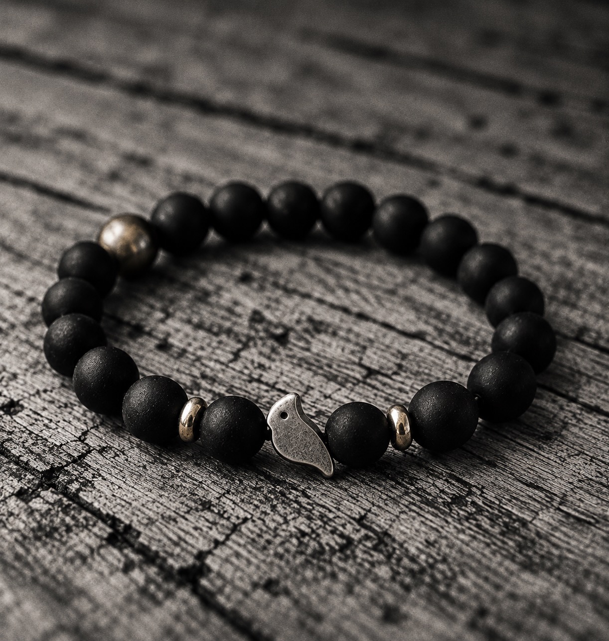 The bracelet on a Sparrow Bag pouch